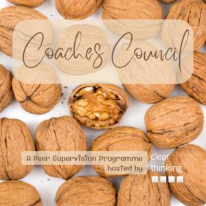 A selection of tightly closed walnuts with one open nut visible in the centre of the selection. Title is Coaches Council